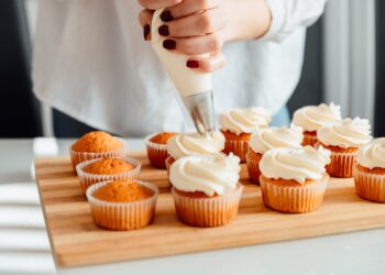 Charge your whipping cream dispenser before baking cup cakes